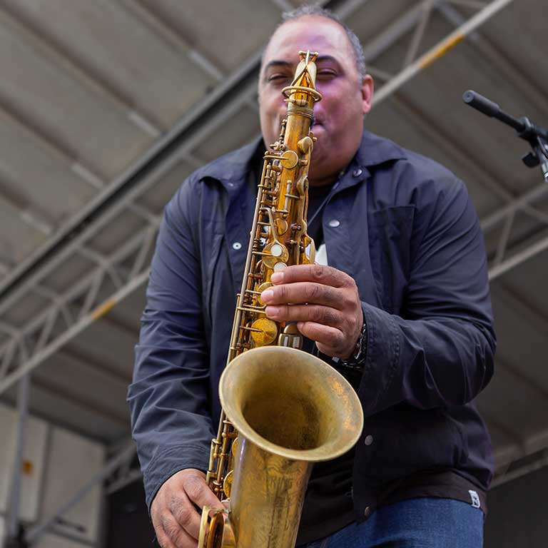 Rob Dixon plays his saxophone during the Talent Showcase.