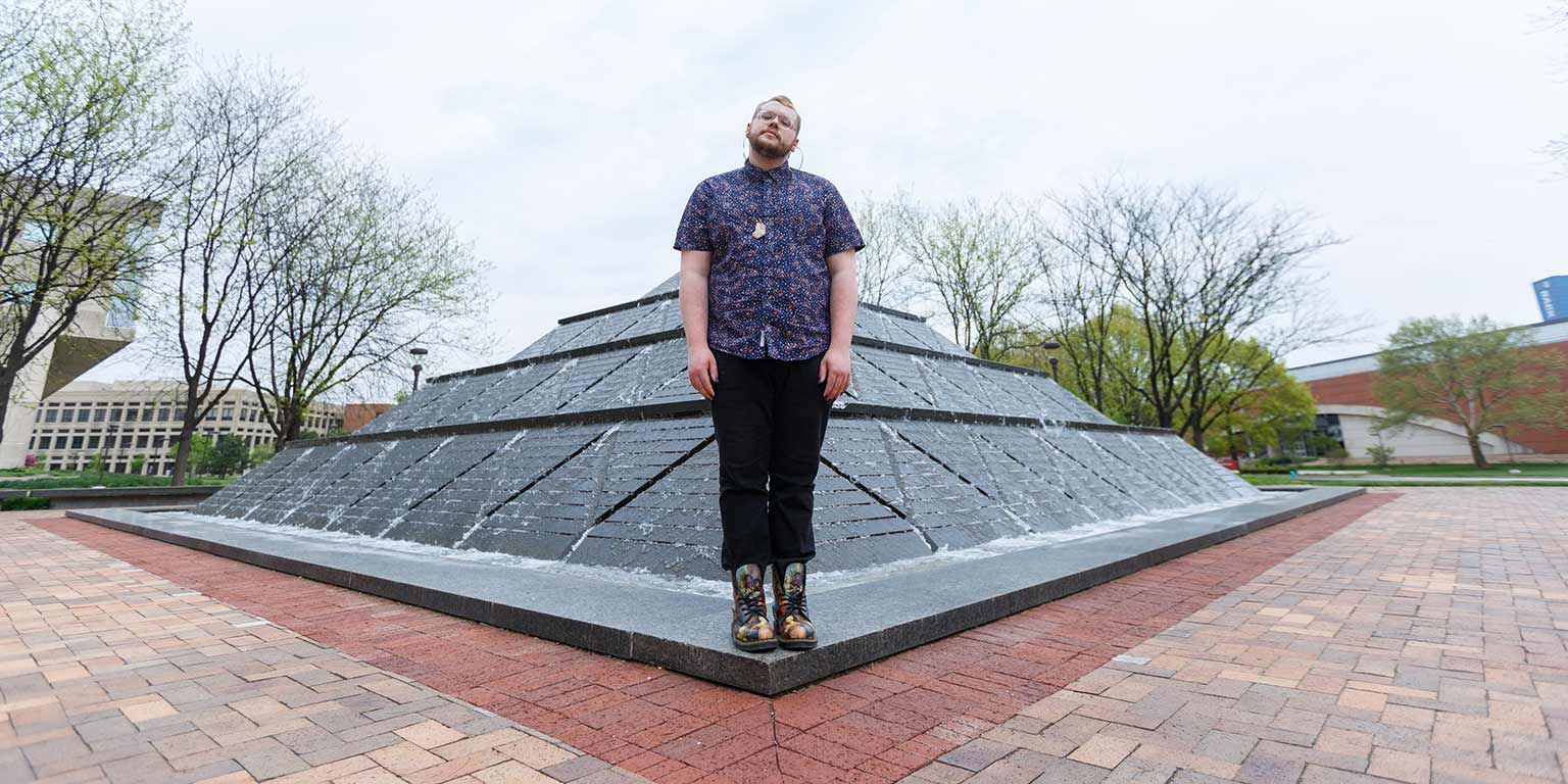 Zach Carrico stands at Wood Fountain.