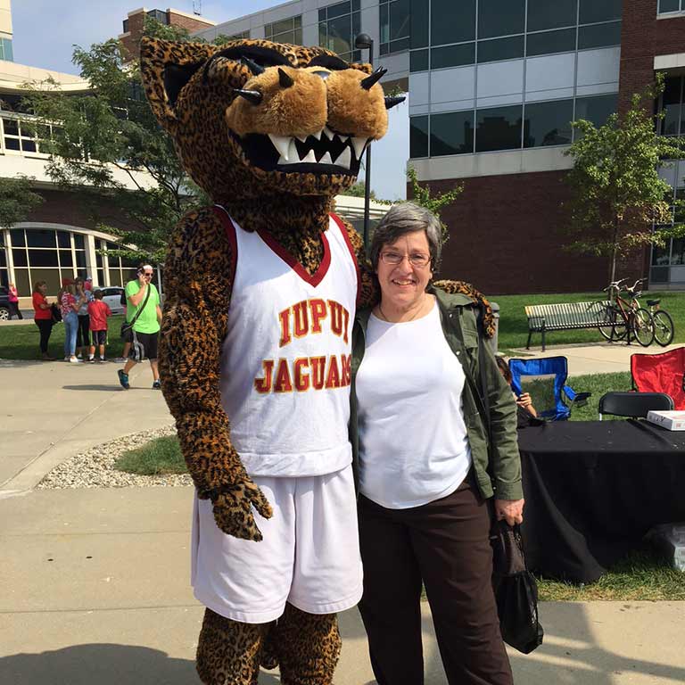 Claudia Dille with Jawz the Jaguar Mascot at the 2016 Regatta.