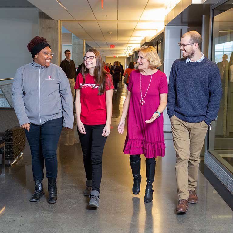 Cindy Harkness chats with some of her Student Ambassadors.