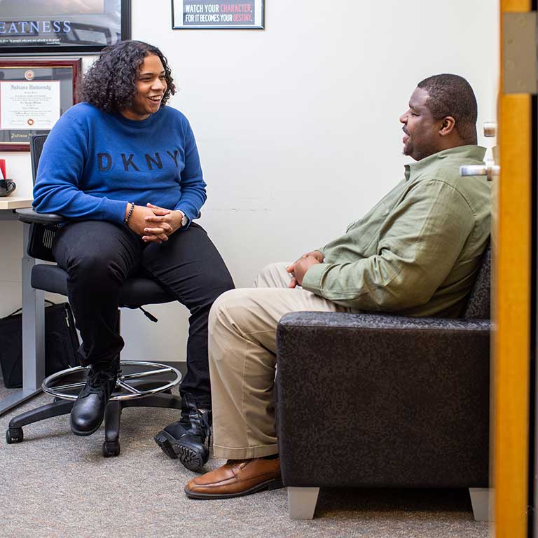 Breon Johnson chats with Eric Williams, Director of the Diversity Enrichment and Achievement Program at IUPUI.