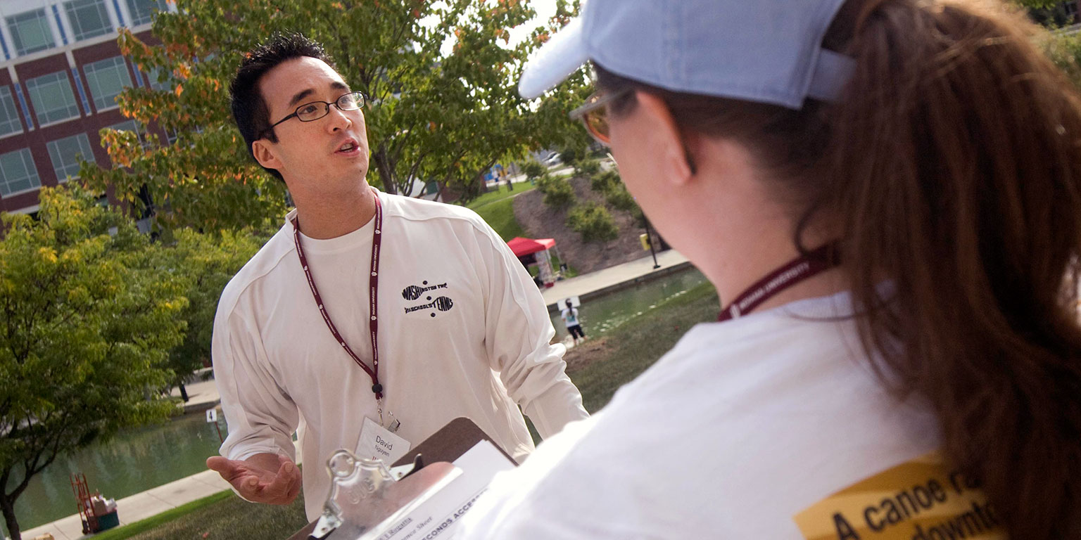 David Nguyen speaks with race judges at the 2009 IUPUI Regatta.