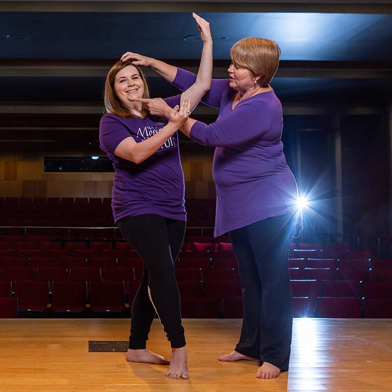 Meghan Nowels gets posed by Moving Company director Paige Craigie.