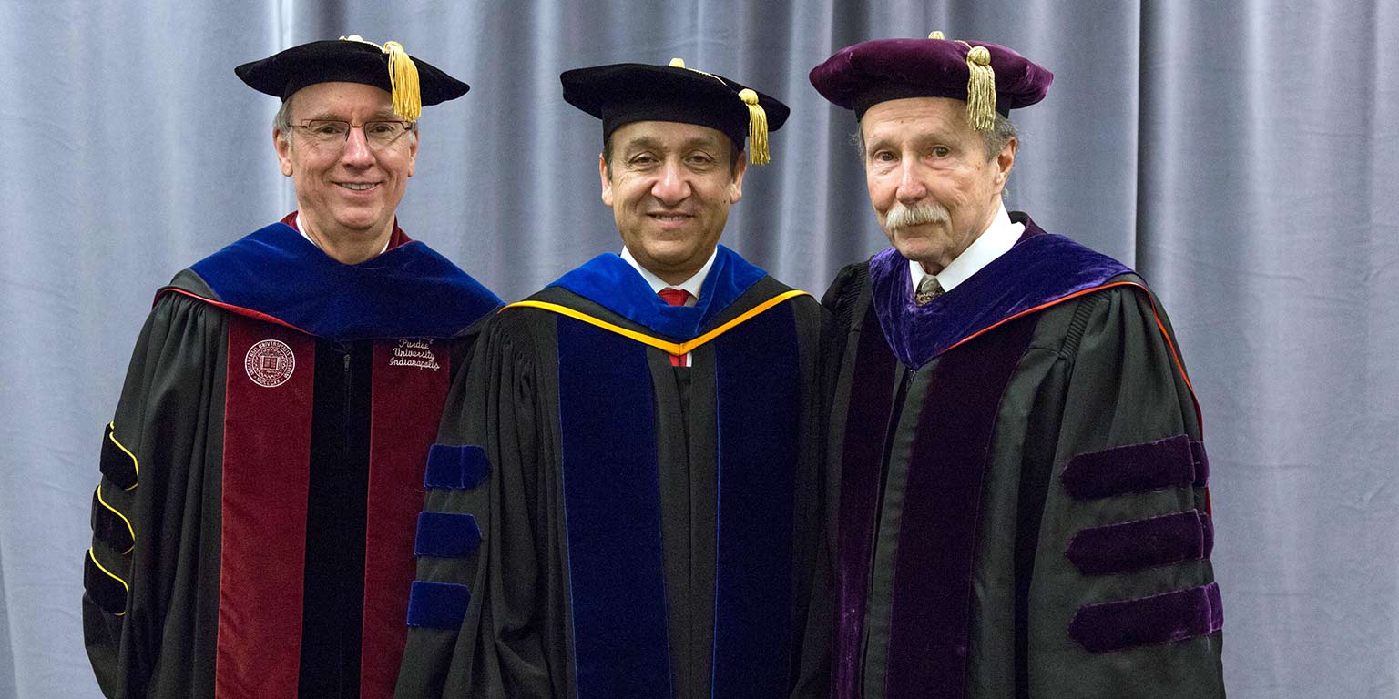 Former IUPUI Chancellors Charles Bantz and Gerald Bepko at Chancellor Nasser Paydar's installation in 2015.